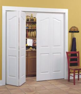 bifold closets door ajar to reveal a well-organized pantry